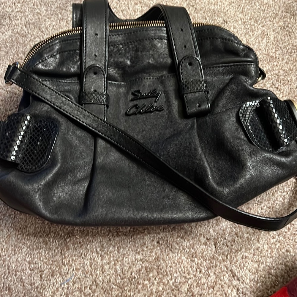 Almost new, shoulder bag, medium size, black leather